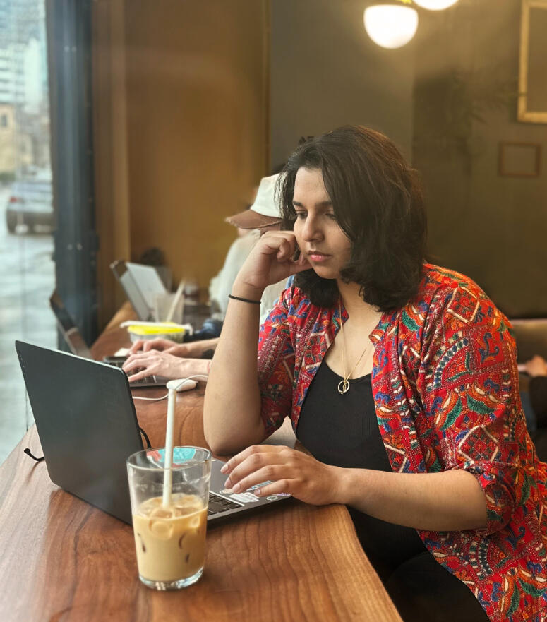 work with me image woman typing on laptop