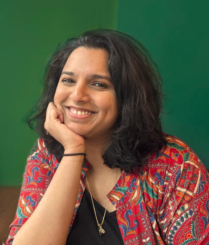 header image woman smiling at camera